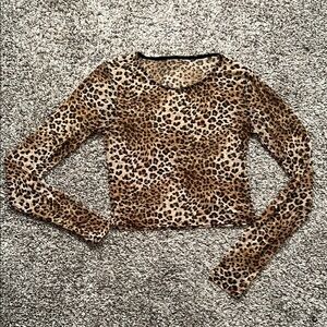Shear leopard print long sleeve top